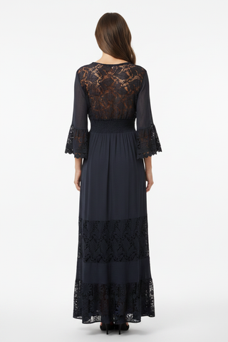 Back view of dress on model with sheer lace back
