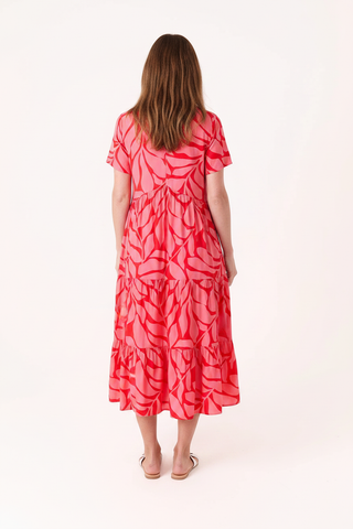 Back view of the Dreams Mega Leaf Dress in poppy red