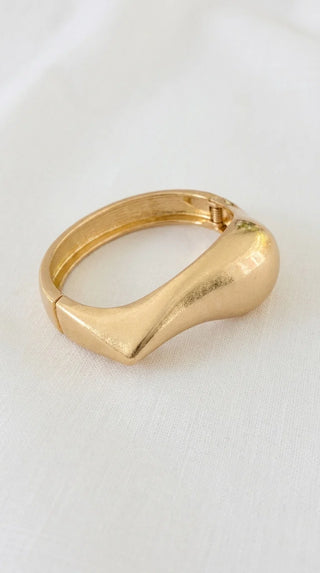 Envy Worn wide hinged bangle