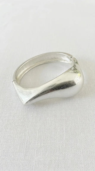 Envy Worn wide hinged bangle