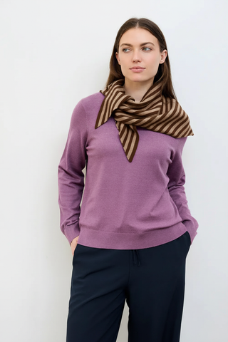 Model wearing the Dreams Striped Triangle Scarf in the Mink colourway