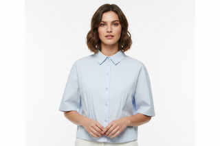 Light blue cropped shirt on model