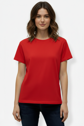 Red T-shirt tucked into jeans